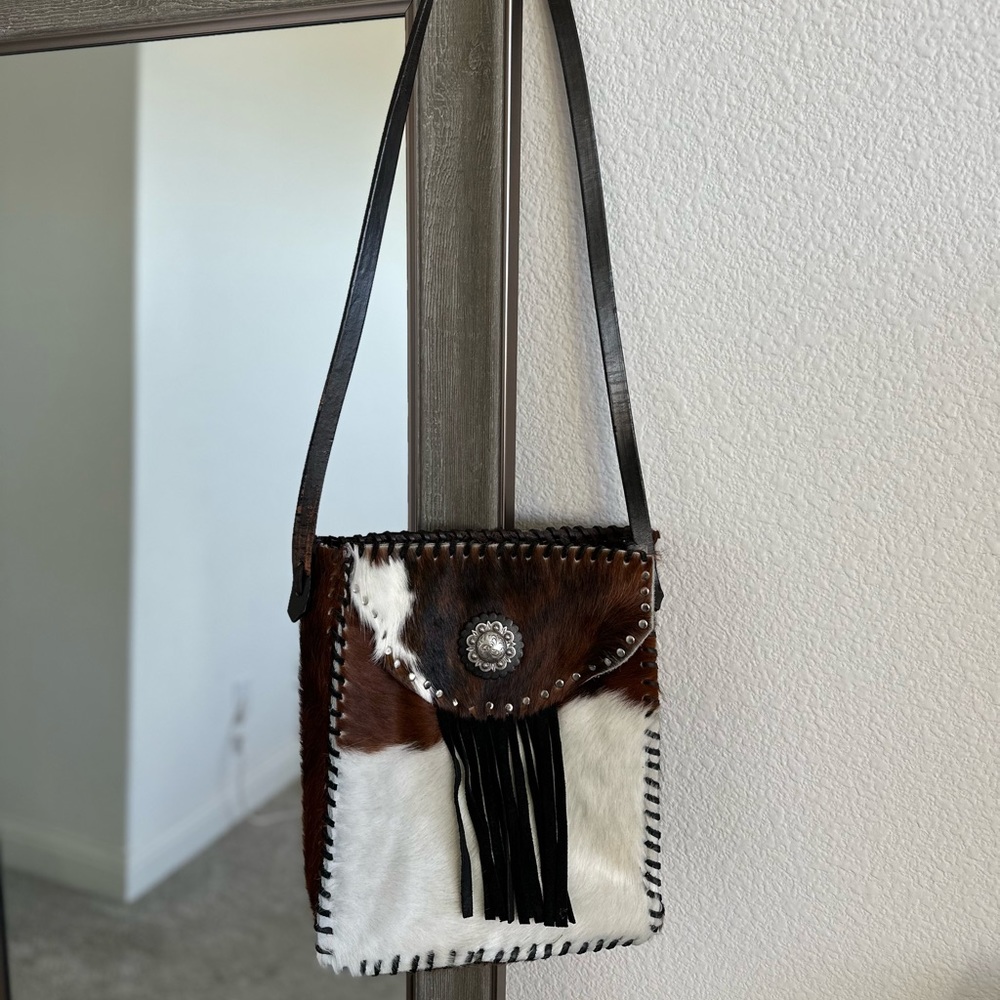 Genuine leather, handmade, crossbody hide purse.